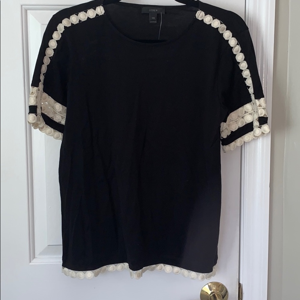 Black top with cream crochet detail
